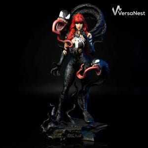 May include: A detailed statue of a female character in a black symbiote suit with red hair and a white spider emblem. The figure is surrounded by black tendrils and two Venom-like creatures with long red tongues. The statue is on a dark base.