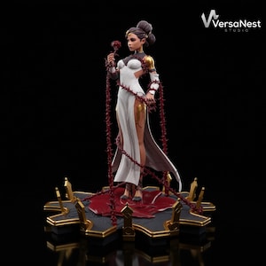 May include: A white ceramic mug with a black handle and the text "But First, Coffee" in a black, bold font. The mug is on a white surface.