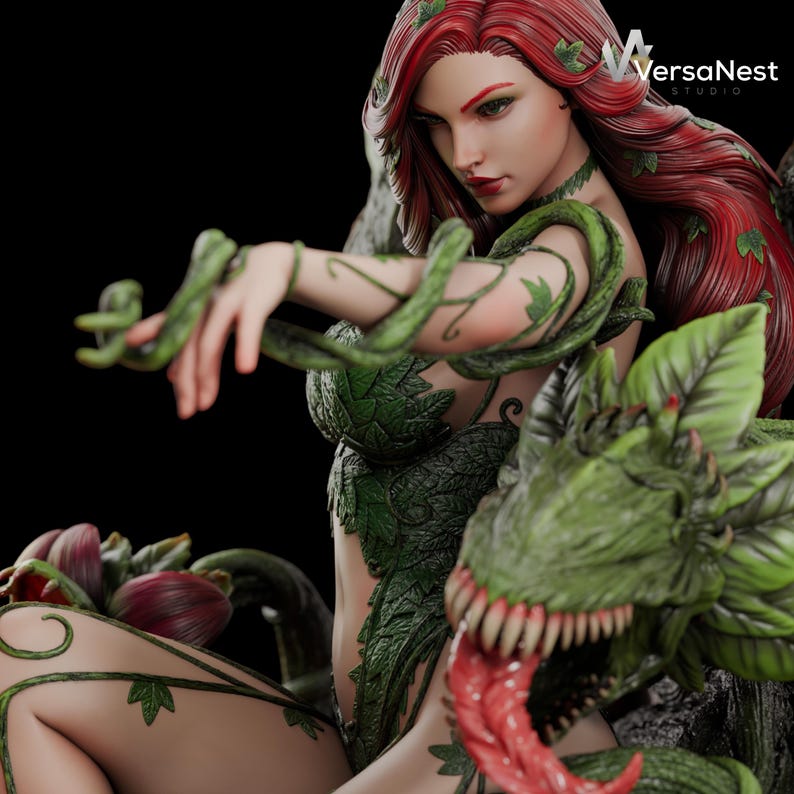 May include: A detailed statue of a woman with red hair, adorned with green vines and leaves. She is posed with a dragon-like creature with a green head and a red tongue. The statue is set against a dark background.