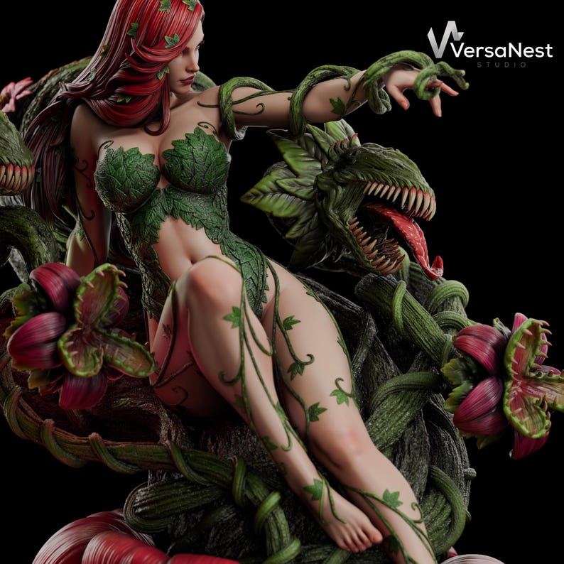May include: A detailed statue of a woman with red hair and green leaf-like attire, surrounded by plant-like structures. The statue has a dark background and features the "VersaNest Studio" logo.