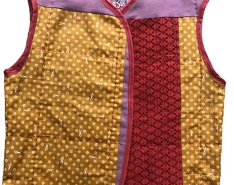 Patchwork quilted waistcoat/sleeveless jacket, stylish, reversible, french seams, hand quilted, handmade and bespoke.