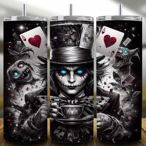 May include: A set of three stainless steel tumblers with a spooky Mad Hatter design. The design features a sinister character with glowing blue eyes, playing cards, and other eerie elements in a black and white color scheme.