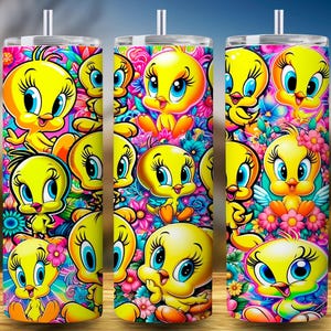 May include: Three stainless steel tumblers with a vibrant design featuring the cartoon character Tweety Bird. The tumblers are covered in a colourful floral pattern with multiple images of Tweety Bird in various poses.
