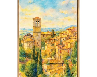 May include: Watercolor painting of a European village with a tall bell tower and buildings with orange rooftops. The artwork is framed in a light brown wooden frame. The sky is blue with yellow and white clouds.