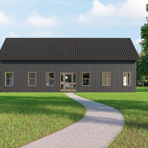 May include: A contemporary building with a dark grey corrugated metal roof and multiple windows. A gravel path leads to the wooden front door. The building is set in a green grassy area with trees under a blue sky.
