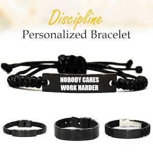 May include: Black personalized bracelets. One features the text "NOBODY CARES WORK HARDER". The image shows three styles: a braided leather, a mesh band, and a silicone band. The text "Discipline Personalized Bracelet" is also visible.