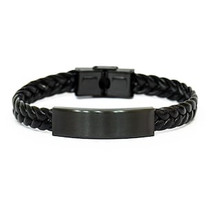 May include: Black braided leather bracelet with a matte black metal clasp and a rectangular metal plate. The bracelet is designed with a woven pattern and a secure clasp.