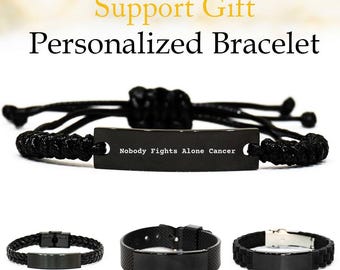 Nessuno combatte da solo - Regalo di supporto contro il cancro, braccialetto per la lotta contro il cancro, regalo per la lotta contro il cancro, regalo per un amico: non sei solo