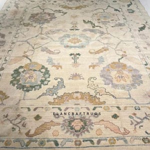 Hand Knotted Turkish Oushak Rug: Pastel Floral Wool Area Rug