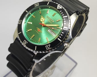 Reloj Citizen Automático para Hombre Reacondicionado, 21 Joyas, Esfera Verde, Piel Sintética Negra, 36 mm