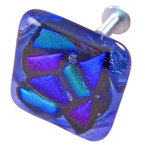 May include: Square glass cabinet knob with a blue iridescent finish and a geometric pattern of purple, blue, and green.
