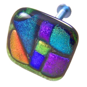 May include: A square-shaped glass cabinet knob with a colorful mosaic design. The knob features shades of green, blue, purple, and orange. The knob has a silver metal screw.