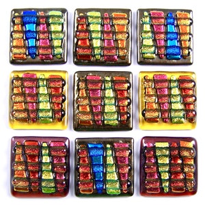 May include: Nine square glass tiles with a woven pattern in shades of blue, green, red, and gold. The tiles have a dark brown border and are arranged in a three-by-three grid. The tiles are on a white background.