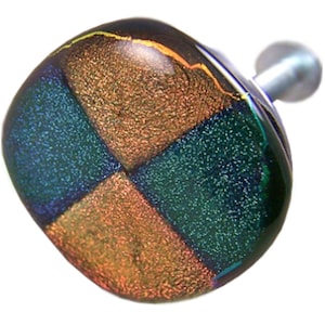 May include: A square, dichroic glass cabinet knob with a silver metal stem. The glass is divided into four quadrants of teal, green, and gold colors. The knob has a rounded, slightly irregular shape.