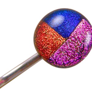 May include: A colorful glass bead on a silver pin. The bead is divided into four sections of red, blue, and purple. The glass has a textured, glittery appearance, reflecting light. The pin is straight and metallic.