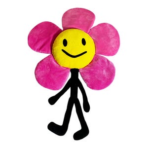 May include: A plush flower-shaped pillow with a yellow smiley face center and pink petals. It has black stick-figure legs and arms, creating a whimsical, playful design. The pillow is designed to be a decorative item.