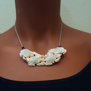 Carved bone, turtle choker with lapis beads and sterling silver chain