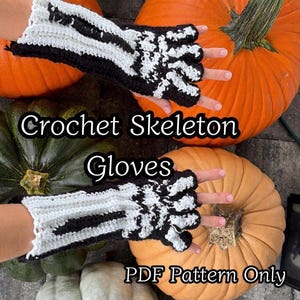 May include: Fingerless gloves crocheted with black and white yarn to resemble a skeleton hand. The gloves feature a white bone pattern against a black background. The text on the image reads Crochet Skeleton Gloves PDF Pattern Only.