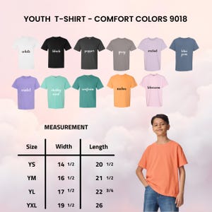 May include: A selection of youth t-shirts in colours such as white, black, and blue jean. The image includes a size chart with measurements in inches. A young person is wearing an orange t-shirt.
