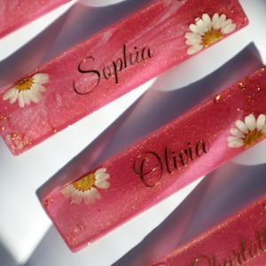 Personalised Pressed Flower Rose pink Resin Bookmark with Gold Vinyl Name, white daisy gold glitter and pink tassel