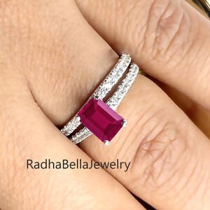 May include: A set of three ceramic mugs with a speckled, matte finish. The mugs are in shades of cream, light gray, and dark gray. Each mug has a simple, minimalist design, perfect for coffee or tea.