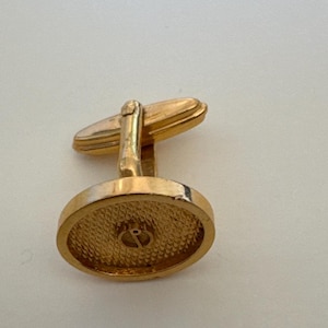 May include: A rustic wooden sign with the text "Welcome to our home" in white lettering. The sign features a distressed finish and a simple, inviting design, perfect for front door decor.