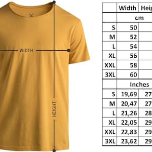 May include: A mustard yellow short-sleeve t-shirt with a crew neckline. A size chart is displayed to the right, listing measurements in inches and centimeters for sizes S through 3XL, showing widths from 19.69 to 23.62 inches and heights from 27.17 to 29.92 inches.