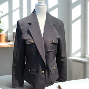 Women&#39;s size 12 sharp-looking Vintage New York & Company Black Blazer with Gold Tone decorative Buttons
