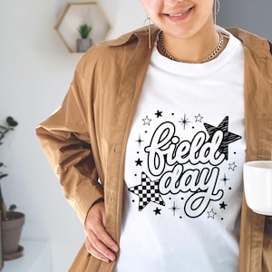 school field day,field day shirt,field day 2026,field day clipart,field day svg,end of school year,last day of school,kids field day,field day shirt png,digital download,teacher life png,student team png,school event png Field Day PNG T-Shirt Designs Field Day Shirt PNG Field Day Clipart Sublimation Designs Digital Download
Field Day PNG T-Shirt Designs Field Day Shirt PNG Field Day Clipart Sublimation Designs Digital Download
Retro Field Day Fun Day PNG: Lightning Design (Digital Download)