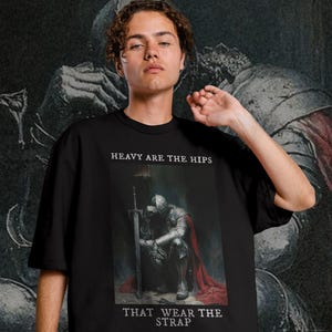 May include: A white ceramic mug with a black handle and the text "But First, Coffee" in a handwritten style. The mug is on a white surface. The mug is 4 inches tall.