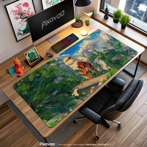 May include: A large rectangular desk mat featuring a vibrant illustration of a fiery, orange and white creature in a mountainous landscape. The mat is 23.6" x 47.2" and has the Pixavaa logo. A computer, keyboard, and mouse are on the desk.
