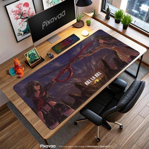 May include: A rectangular desk mat featuring anime artwork with the text "KILL LA KILL." The mat depicts two characters wielding weapons against a dark, cloudy sky. The mat measures 23.6" x 47.2" (60x120cm).