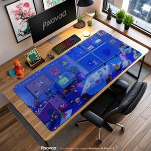 May include: A large blue desk mat with a cartoon illustration of a room interior, featuring characters and objects. The mat, measuring 23.6" x 47.2", has a Pixavaa logo at the bottom. A computer, keyboard, and mouse sit on the mat.