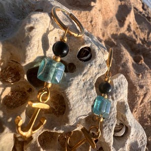 Upcycled earrings adorned with Hawk&#39;s Eye and marine anchor