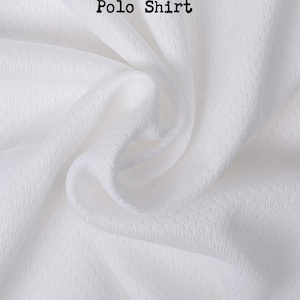 May include: A white polo shirt fabric with a visible mesh texture and small perforations throughout the material. The words Polo Shirt are printed in a black, typewriter-style font near the top center of the image, showing folds and drapes.