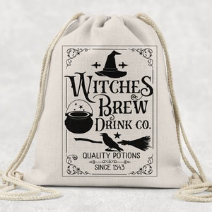 May include: A beige drawstring bag with a black graphic design. The design features the text "Witches Brew Drink Co." with a witch's hat, cauldron, broom, and raven. The text "Quality Potions Since 1543" is also included.