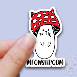 May include: A white sticker with a cartoon cat wearing a red and white mushroom hat. The text "MEOWSHROOM" is below the cat.