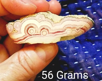 Rare rhodochrosite 56g specimen perfect for display or collection, bright pink colors with great whorl patterns, from Argentina