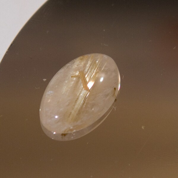 Rutilquarz--7,71 ct Oval Cab