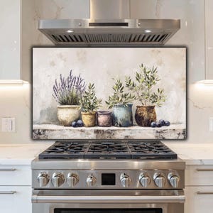 May include: A rectangular canvas print featuring a still life of potted plants. The artwork showcases lavender, olive branches, and other greenery in various ceramic pots. The color palette includes beige, green, purple, and brown tones.