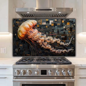 May include: A decorative kitchen backsplash featuring a vibrant jellyfish design. The jellyfish is depicted in shades of orange, yellow, and white against a dark, mosaic-style background. The image is installed above a stainless steel stove.