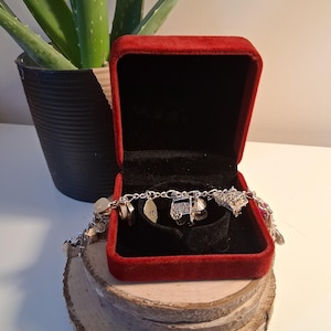 Sterling silver charm bracelet with charms