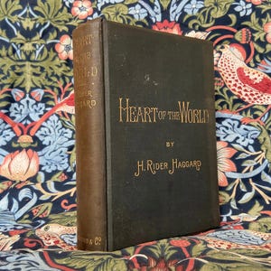 RARE Antique Book FIRST EDITION Heart of The World by H Rider Haggard 1896 Beautiful Gilt Antique Book