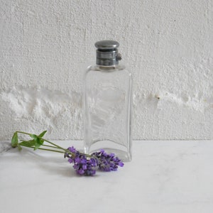 J D & S glass and silver flask