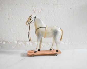 antique German celluloid horse pull toy