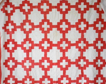 Antique red and white Swiss cross quilt