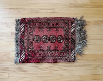 Vintage small Afghani wool rug