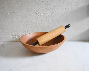 vintage rolling pin with black handle