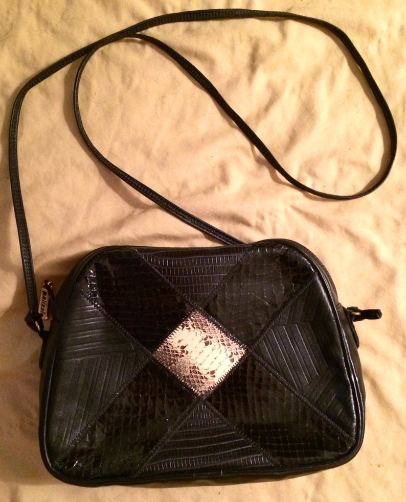 black snake print bag