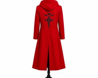 May include: A long, bright red coat featuring a hood and long sleeves. The back of the coat displays a prominent black embroidered symbol consisting of a cross, a snake, and wings. The coat has a straight hemline with a central vertical back vent.